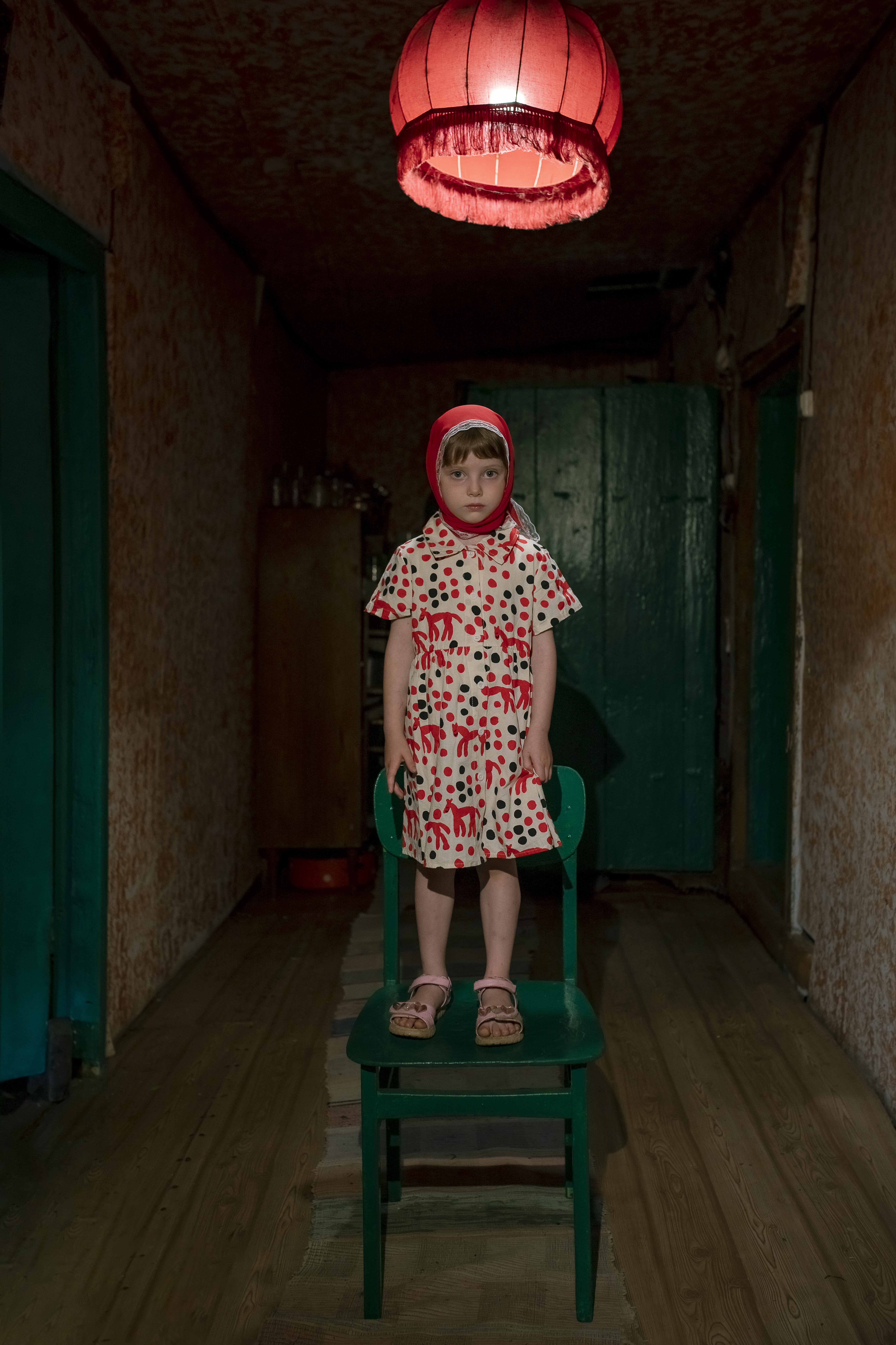 Girl under a lampshade